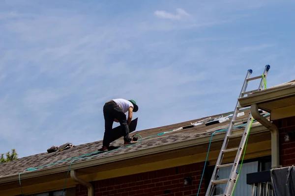 The Role of a Roofing Replacement Contractor in Storm Damage Repairs